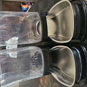 Stainless Steel and Black Pet Food Dispensers